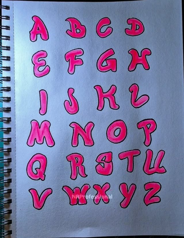 Pink hand-drawn bubble letters of the alphabet arranged in rows on white paper.